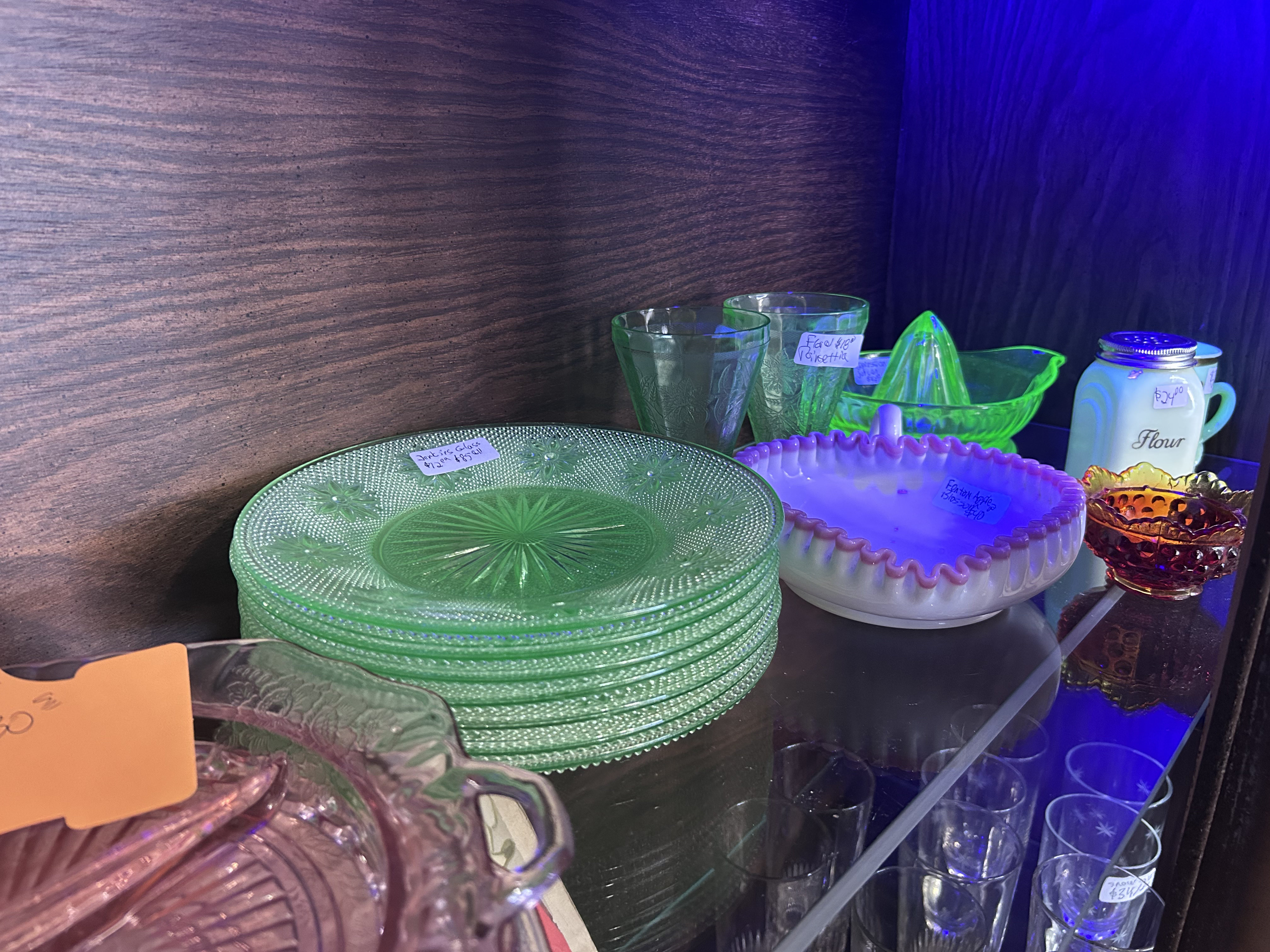 Uranium glass plates glowing under UV light