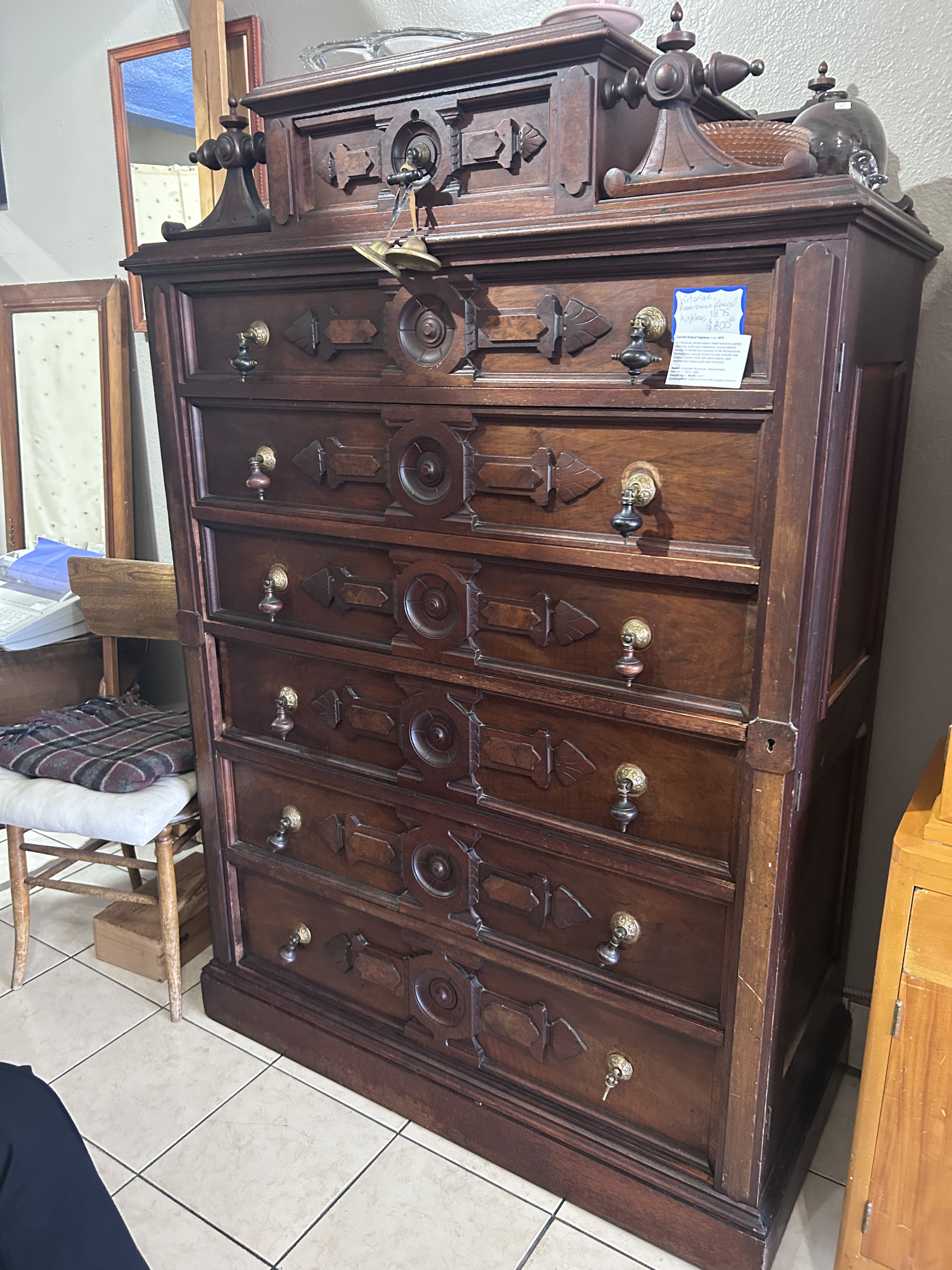 Architecturally carved walnut highboy circa 1875